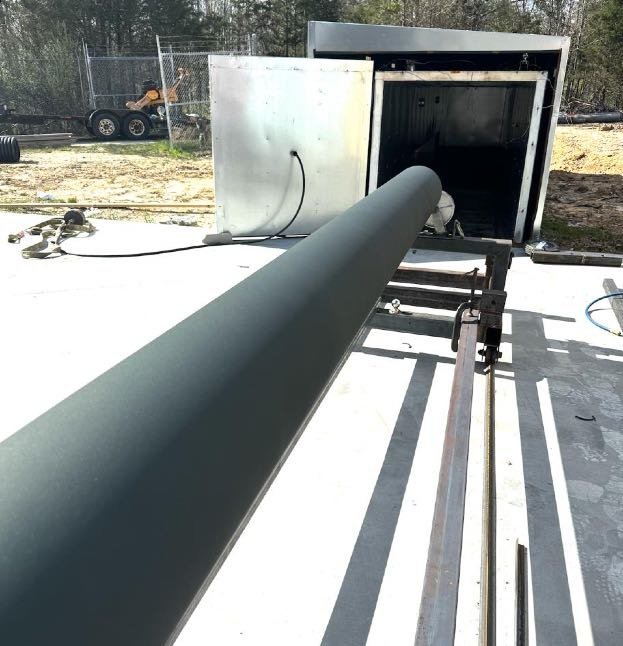 Large industrial convection oven used for traditional coating heat activation