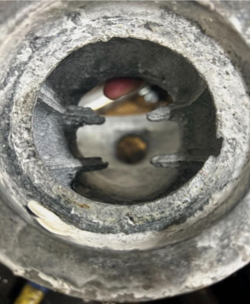 Aluminum caustic circulation pump internals with traditional coating after three months service